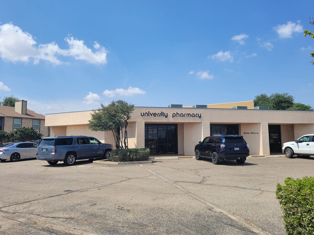 University Pharmacy, seen from the parking lot.